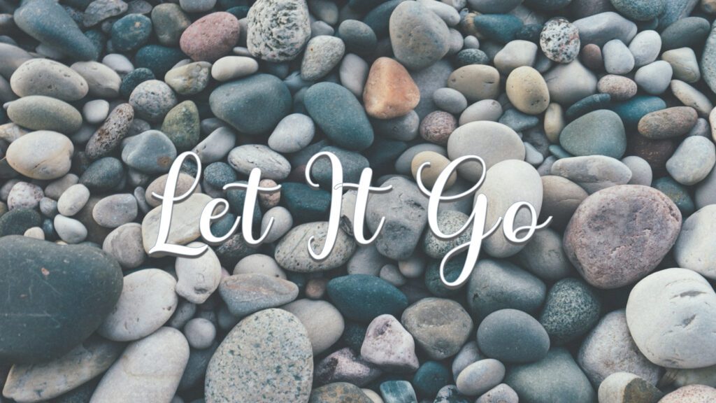 round-rocks-with-text-overlay-that-says-Let-It-Go