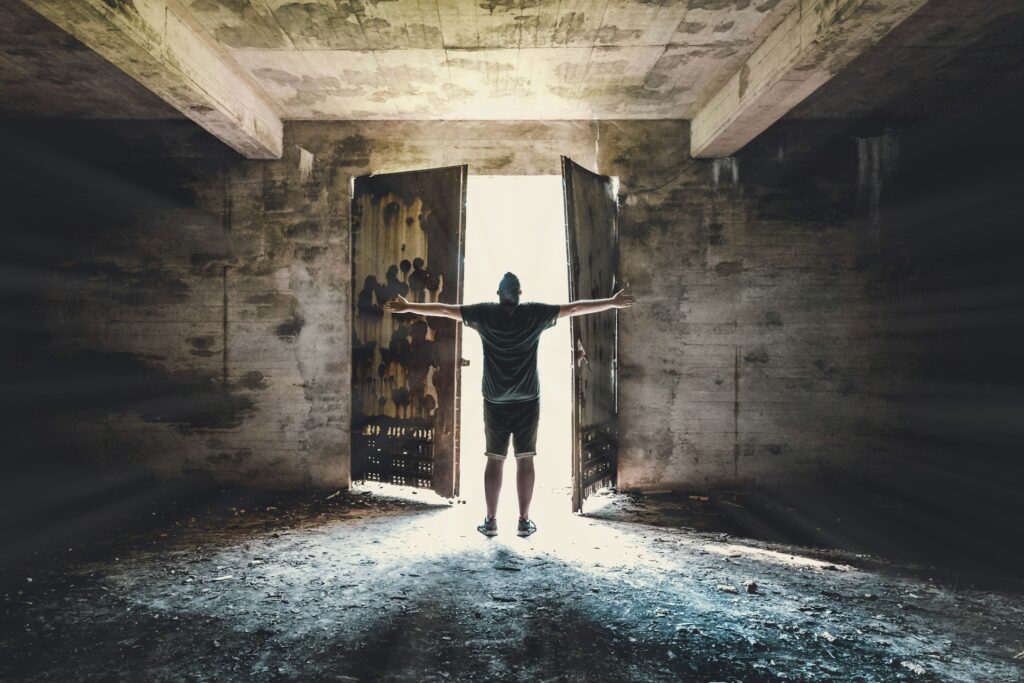 light-shining-through-door-with-man